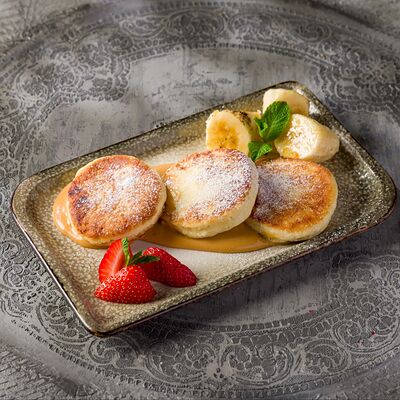 Сырники со сметанным соусомв Дюшес по цене 490