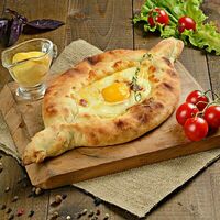 Хачапури по-аджарски в ALGA Вкус Кавказа
