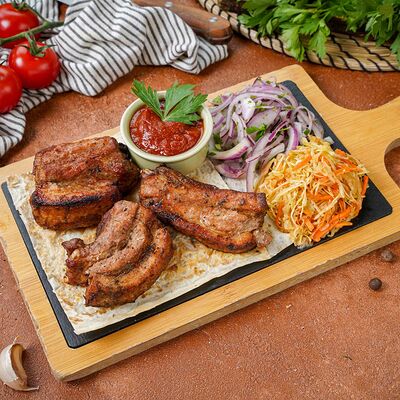 Свиные ребрышки на углях в СМАК Раменки по цене 940 ₽