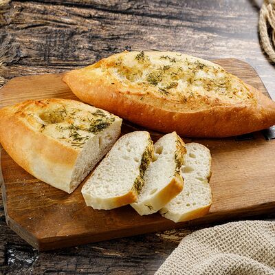 Багет чесночный в Ватруш пекарня-кондитерская по цене 95 ₽