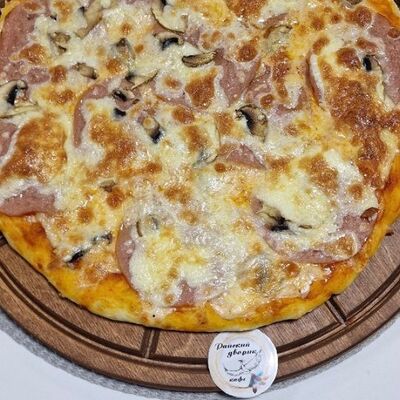 Пицца Ветчина-грибы в Райский дворик по цене 1100 ₽