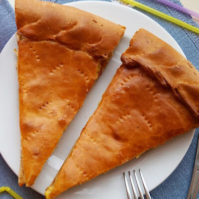 Закрытая пицца Кальцоне с курицей (кусочек) в Дока пицца по цене 250 ₽