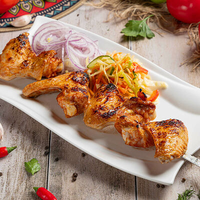 Куриные крылышки в Вкус востока по цене 469 ₽
