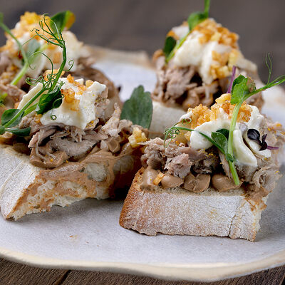 Брускетта с чёрным паштетом и уткой в Christian по цене 820 ₽