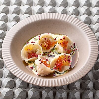 Пельмени с щукой, икрой и соусом из раковых шеек в KITCHEN по цене 870 ₽