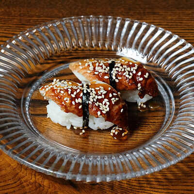 Нигири Угорь в Ezo Izakaya по цене 480 ₽