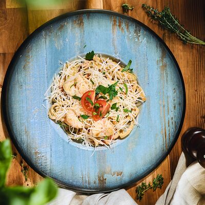 Wok с креветками в сливочном соусе в Luna Urban по цене 820 ₽