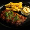 Глазированные свиные ребра с картофелем фри в Cocos Lounge по цене 1040