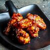 Куриные крылья с соусе BBQ и кунжуте в Luna по цене 790