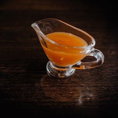 Кисло-сладкий соус в Хинкали хаус по цене 82 ₽