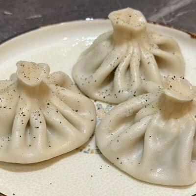 Хинкали с говядиной и свининой в Аджика по цене 120 ₽