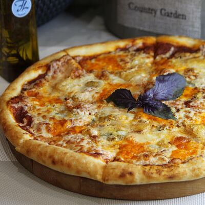 Пицца Четыре сыра в Foodlink по цене 800 ₽