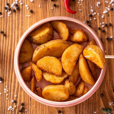 Картофель по-деревенски в Адельфия по цене 180 ₽