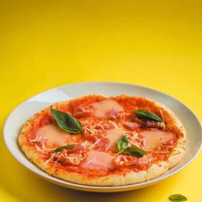 Пицца Веселая помидорка в Баклажан по цене 420 ₽