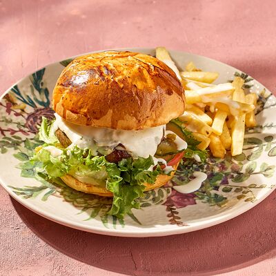 Бургер с мраморной говядиной и картофелем фри с сырным соусом в KITCHEN по цене 890 ₽