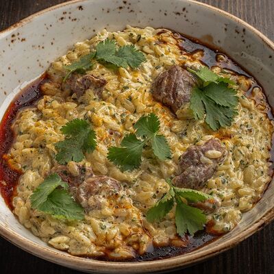 Орзотто с рибаем и вешенками в Лепрекон по цене 790 ₽