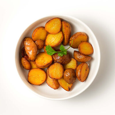 Жареный молодой картофель с хмели-сунели и кинзой в Saperavi Cafe по цене 329 ₽