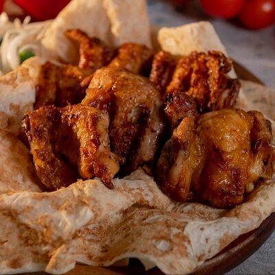 Шашлык из куриного бедра в Шашлычок по цене 1200 ₽