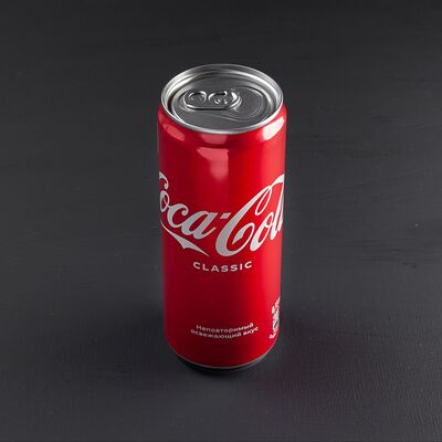 Газированный напиток Coca-Cola в едDA по цене 140 ₽