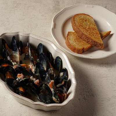 Мидии в сливочном соусе в Bocconcino по цене 1630 ₽