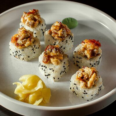 Запеченный ролл с угрем и сыром пармезан в Per Se по цене 1450 ₽