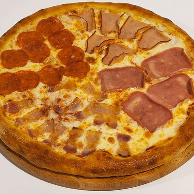 Пицца Мясное ассорти в Добрая кухня по цене 699 ₽