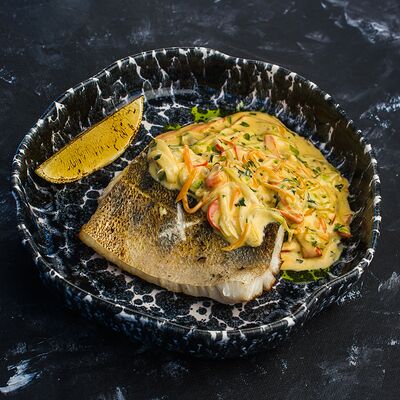 Стейк из трески с овощами в География по цене 500 ₽