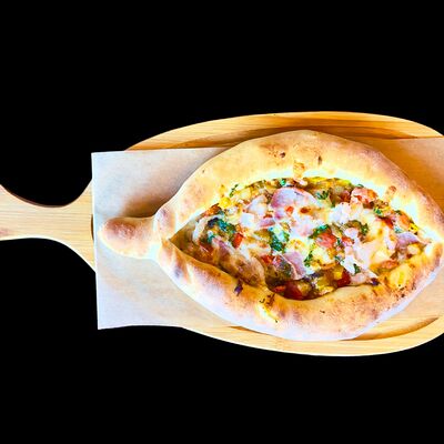 Хачапури с овощами и беконом в Хинкальная 63 по цене 550 ₽