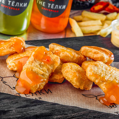 Наггетсы куриные в The Тёлки по цене 149 ₽