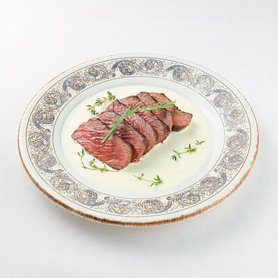 Тальятта из Нью-Йорк стейка с фондю из пармезана в La Scala Trattoria Ignazio по цене 98 р.