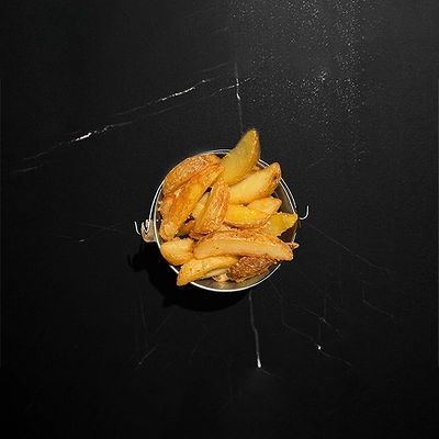 Картофельные дольки в Red Rocket Bar по цене 220 ₽