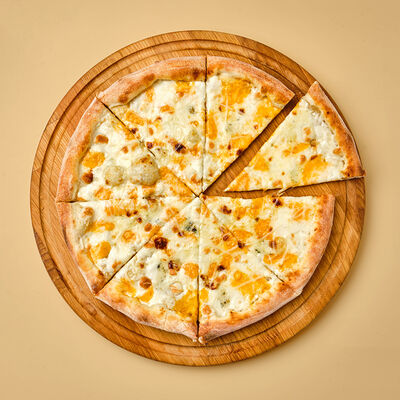 Пицца Четыре сыра в Атлас еды по цене 800 ₽