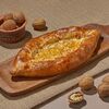 Хачапури лодочка с орехом и сырами в Dostaевский по цене 642