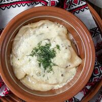 Вареники мясные, запеченные с сыром в Корчма Хуторок