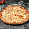 Пицца с сыром, ветчиной и грибами S в PIZZAZAVR по цене 510