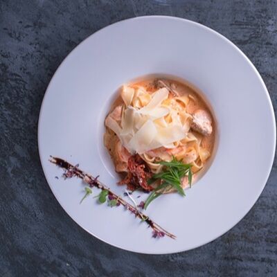 Феттуччине с лососем в Асгард по цене 946 ₽