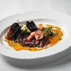 Стейк из говядины с креветками и мидиями с перечно-сырным соусом в Brasserie Lambic по цене 1490