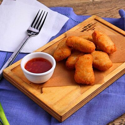 Куриные наггетсы в Андеграунд Pizza & Sushi по цене 230 ₽