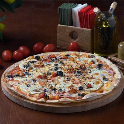 Пицца Капричоза в Лимончини по цене 795 ₽