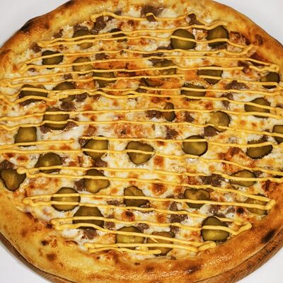 Пицца Бургер в Добрая кухня по цене 699 ₽