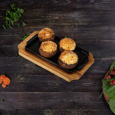 Фаршированные шампиньоны с сыром в Ассадо по цене 560 ₽