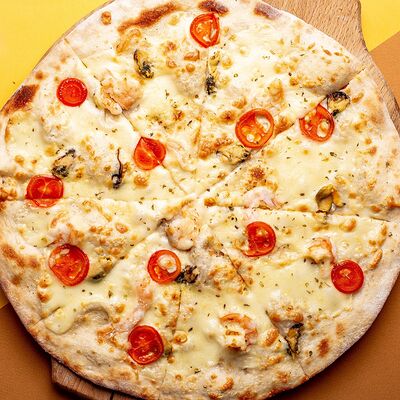 Пицца с Морепродуктами в Eedaa по цене 490 ₽