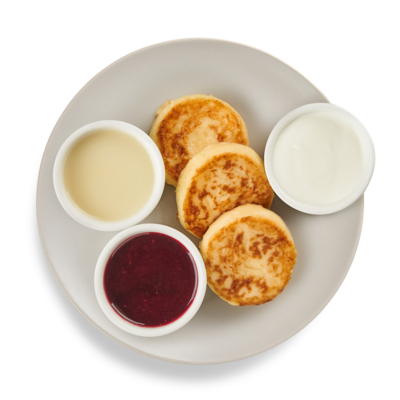 Сырники со сметаной, джемом и сгущёнкой в Готово китчен по цене 205 ₽
