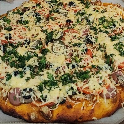 Пицца ассорти в В нашем дворе по цене 1400 ₽