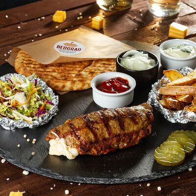 Сет с плескавицей, фаршированной сыром и ветчиной в Гриль-бар Београд по цене 500 ₽