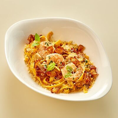 Паста с артишоками и креветкойв Регано по цене 975 ₽