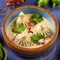 Хинкали с грибами и трюфельным соусом в Асканели Georgian Bistro