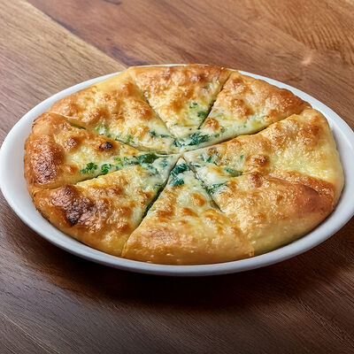 Хачапури классический большой с сыром и зеленью в Кафе хачапури по цене 608 ₽