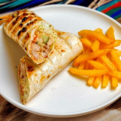 Шаурма с курицей в Чайхана Арафа по цене 450 ₽