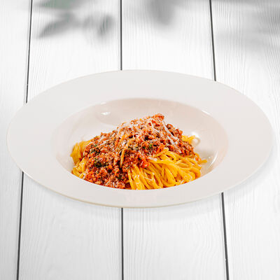 Болоньезе с мясным рагу и томатным соусом в Перчини по цене 530 ₽